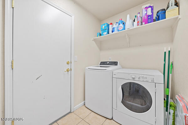 8994 Wynne Street Reno, NV 89506 - Photo 12 of 26 a utility room with dryer and washer