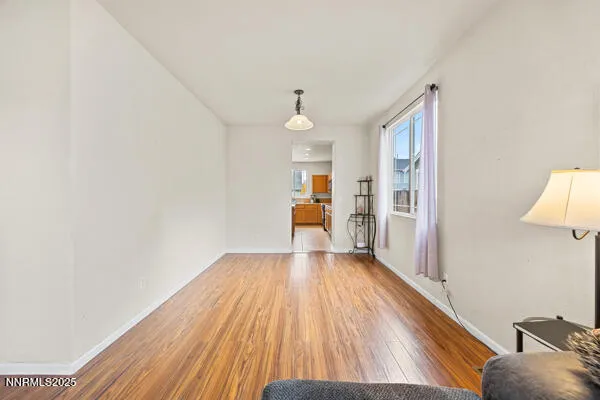 a view of a livingroom with wooden floor