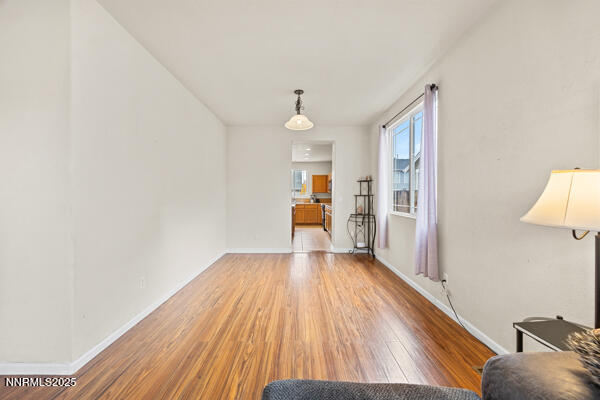 8994 Wynne Street Reno, NV 89506 - Photo 5 of 26 a view of a livingroom with wooden floor
