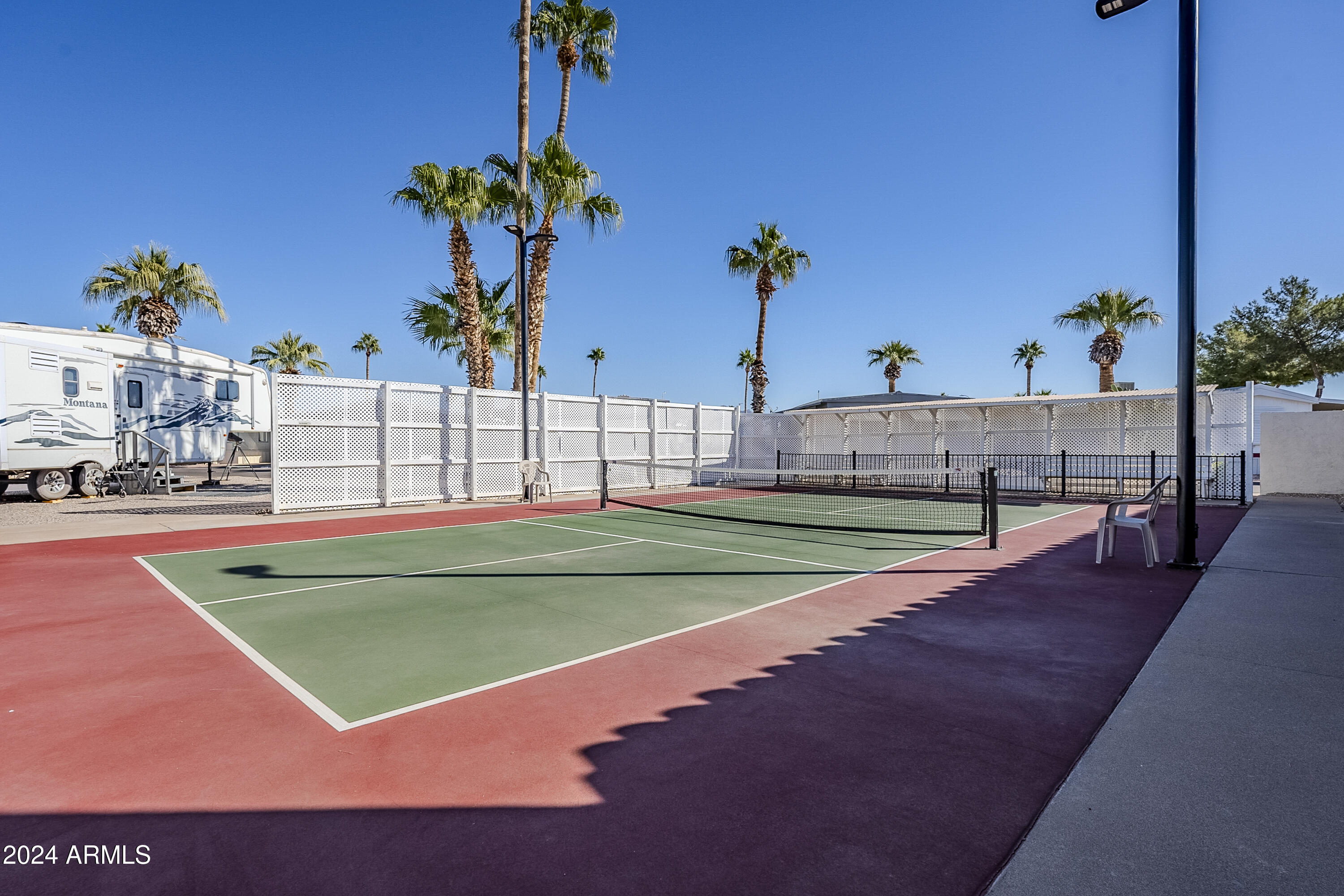 10220 East Apache Trail, Unit 213 Apache Junction, AZ 85120 - Photo 29 of 30 a view of a tennis court