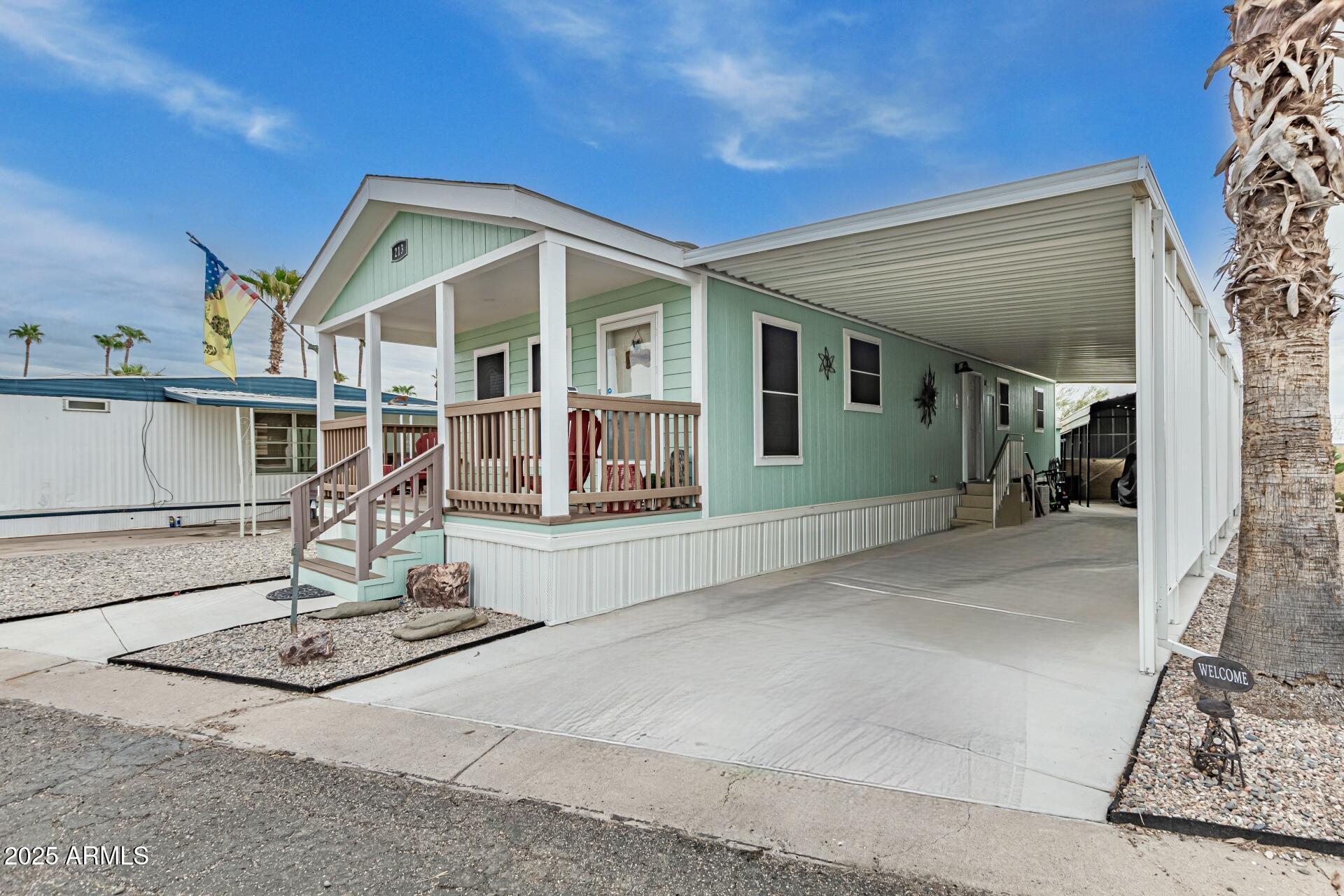 10220 East Apache Trail, Unit 213 Apache Junction, AZ 85120 - Photo 2 of 30 a view of a house with sitting area