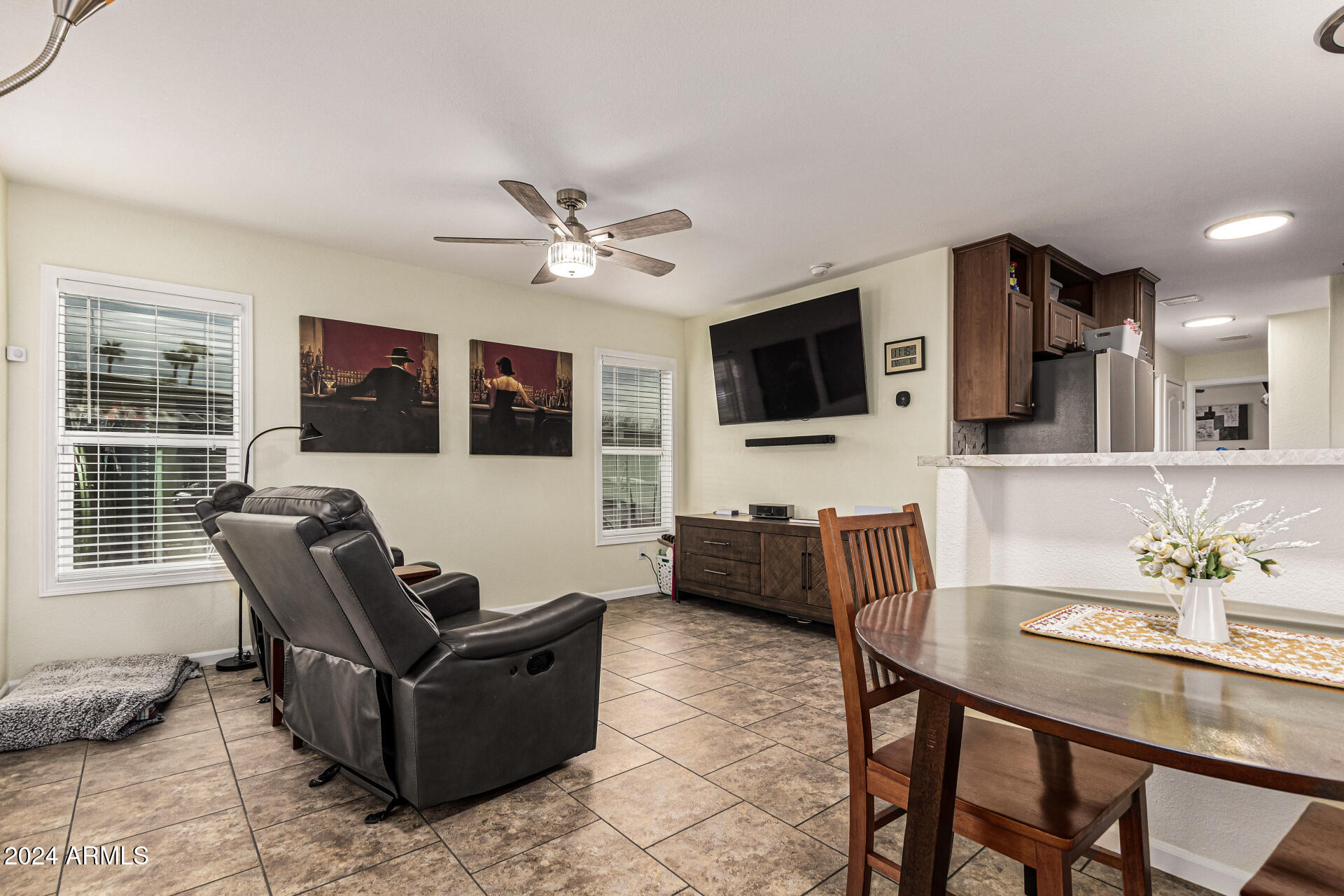 10220 East Apache Trail, Unit 213 Apache Junction, AZ 85120 - Photo 8 of 30 a living room with furniture and a flat screen tv