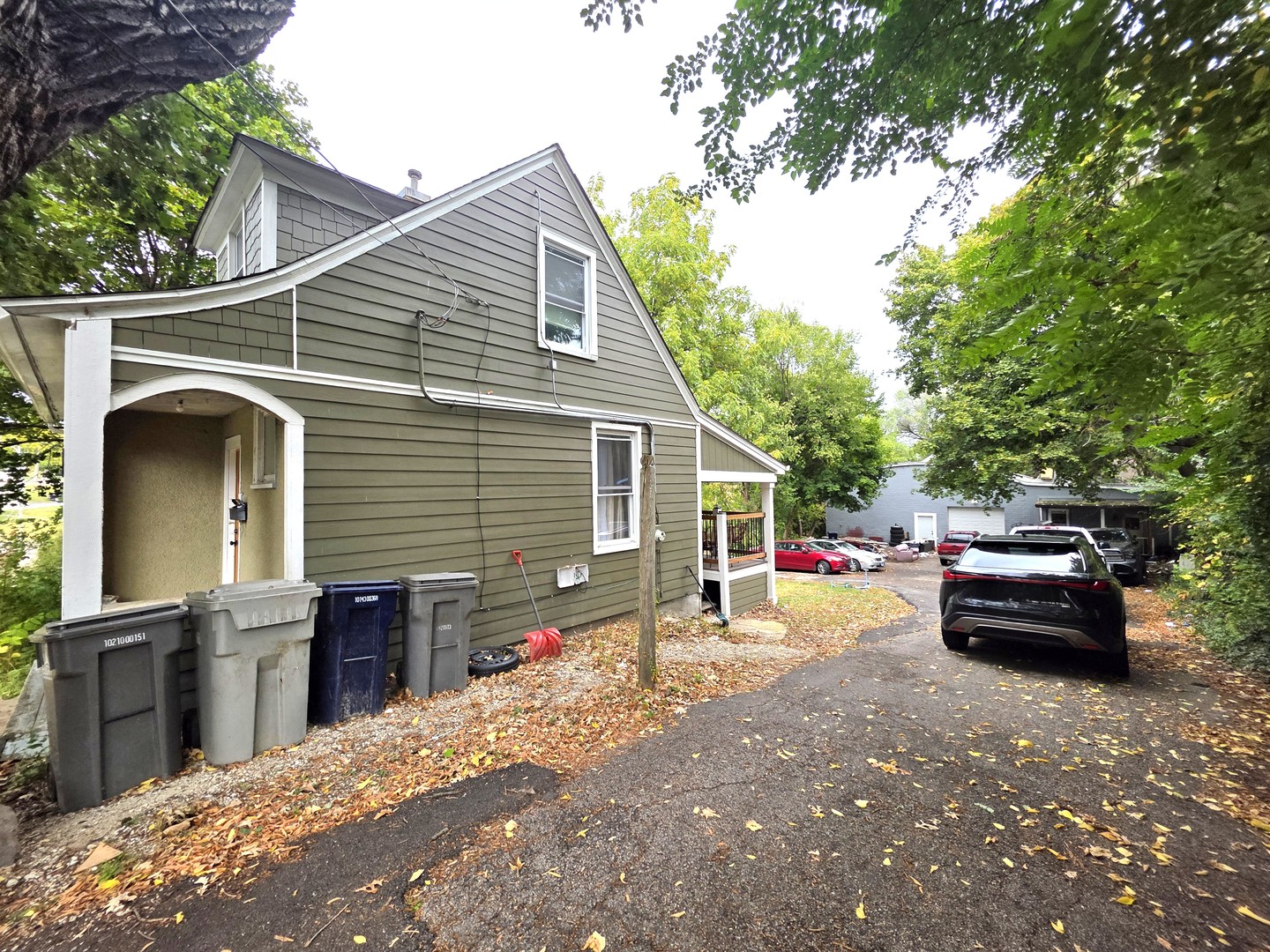 9 North Jackson Street Elgin, IL 60123 - Photo 12 of 13 a view of house with a patio