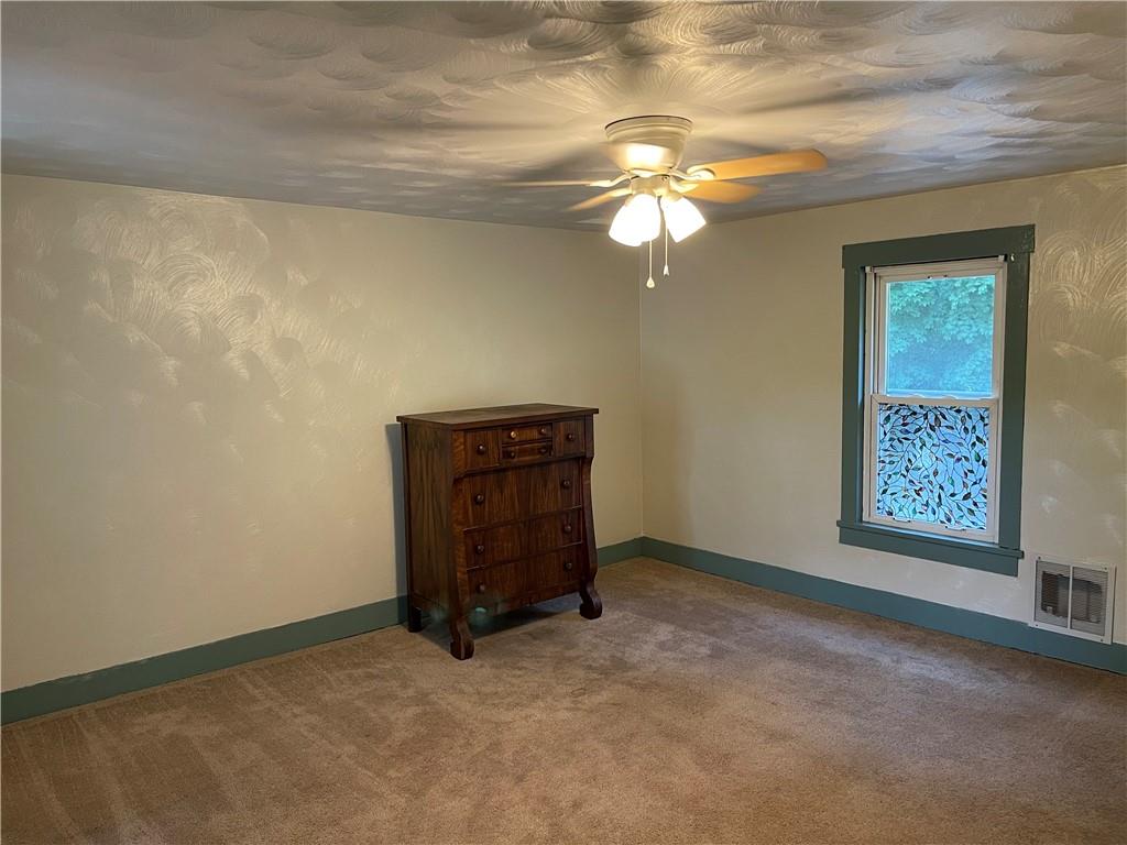223 Lenkey Road Vanderbilt, PA 15486 - Photo 12 of 18 a view of an empty room with a window