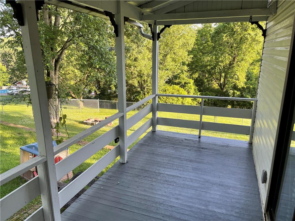 223 Lenkey Road Vanderbilt, PA 15486 - Photo 13 of 18 a view of an outdoor space and deck