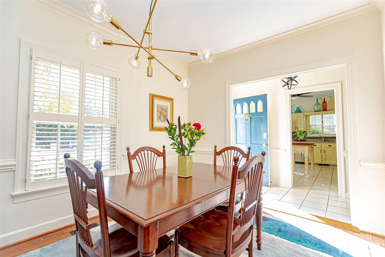 767 Weathergreen Drive Raleigh, NC 27615 - Photo 1 of 21 a dining room with furniture and window