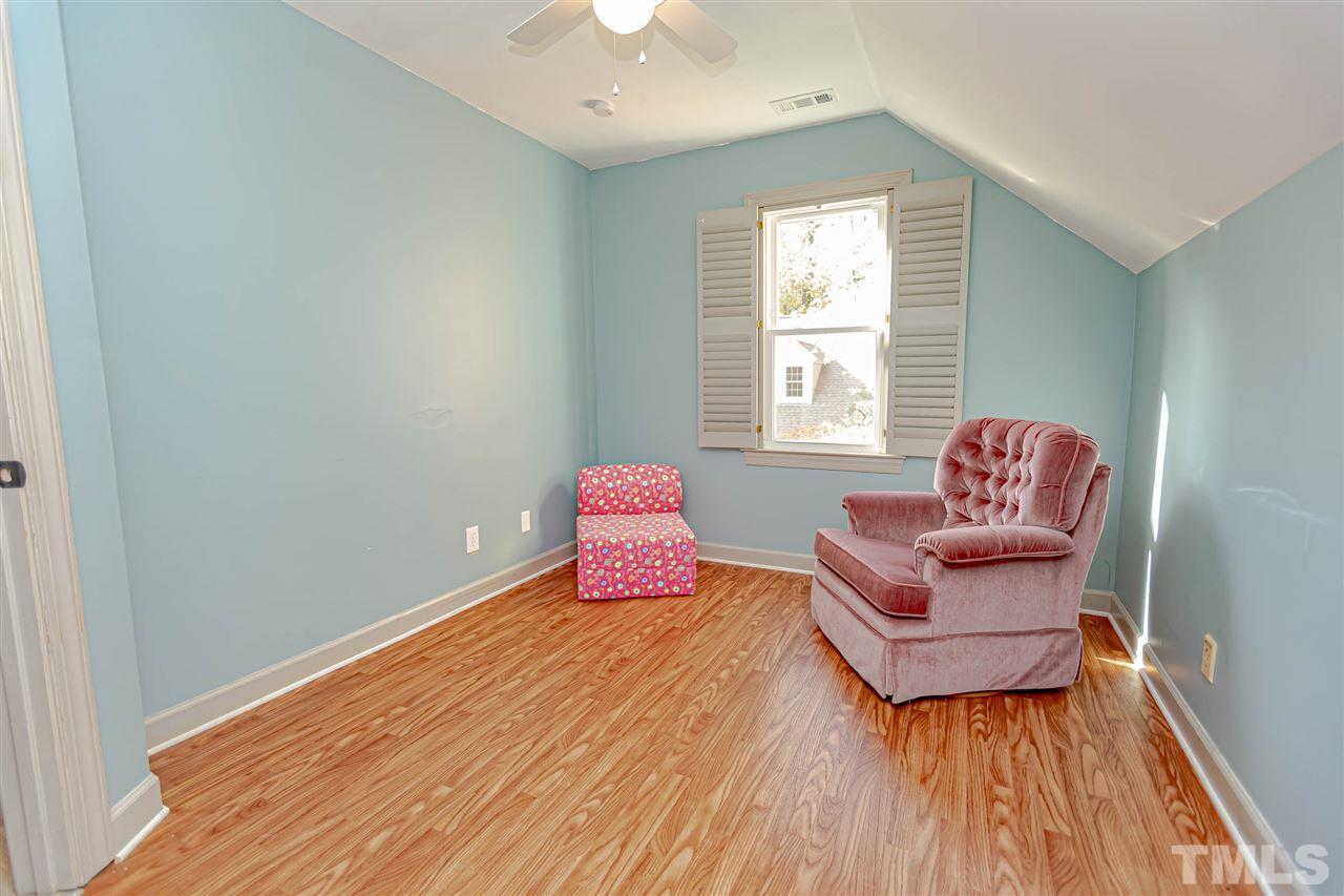 767 Weathergreen Drive Raleigh, NC 27615 - Photo 13 of 21 a bedroom with wooden floor and a window