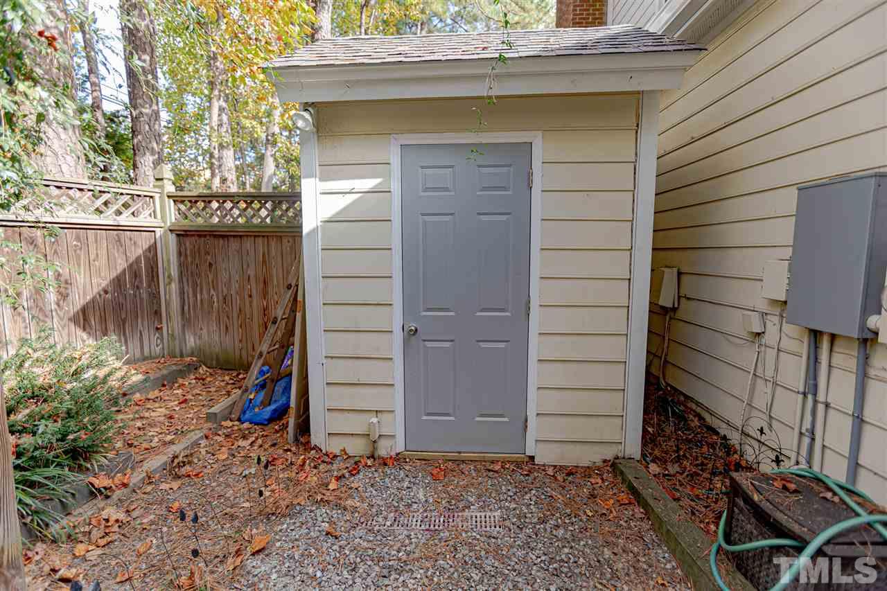 767 Weathergreen Drive Raleigh, NC 27615 - Photo 18 of 21 a view of a small house