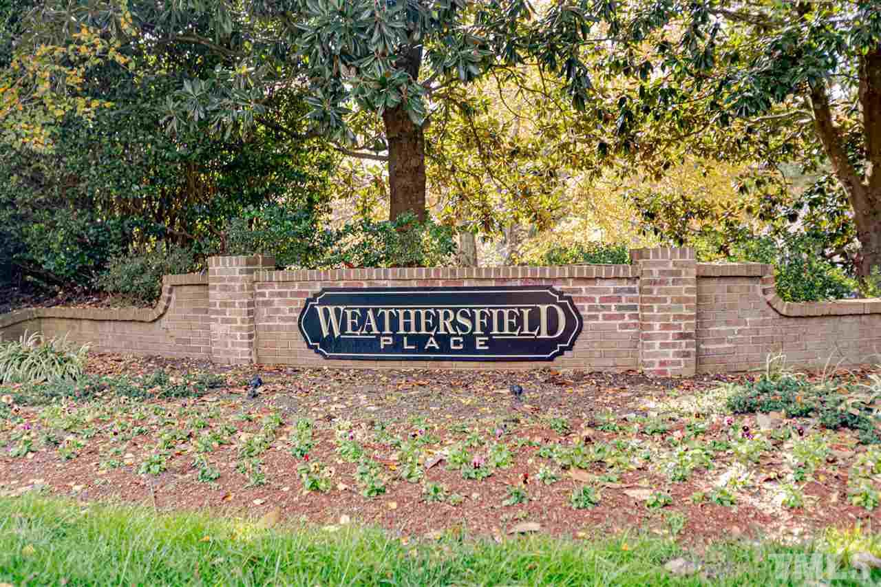 767 Weathergreen Drive Raleigh, NC 27615 - Photo 19 of 21 a sign broad in front of a white house