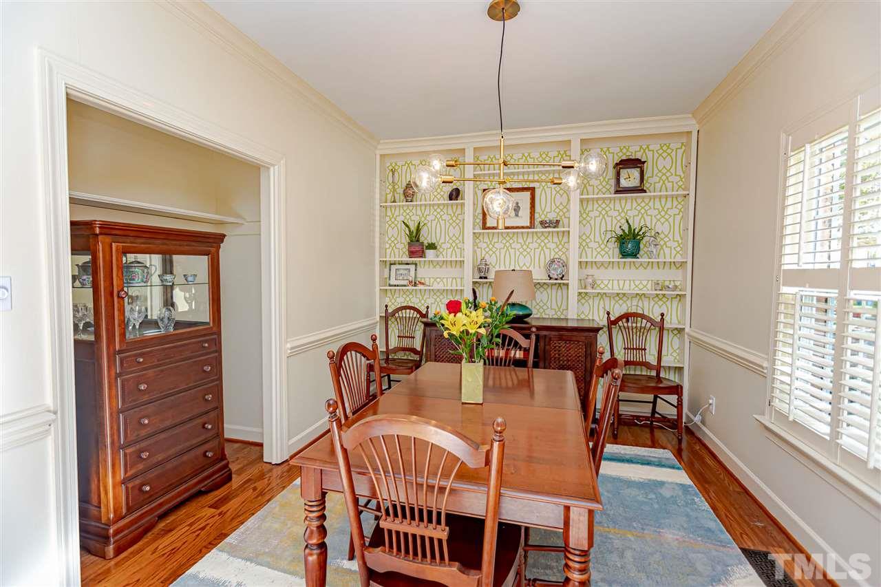 767 Weathergreen Drive Raleigh, NC 27615 - Photo 6 of 21 a view of a dining room with furniture window and outside view