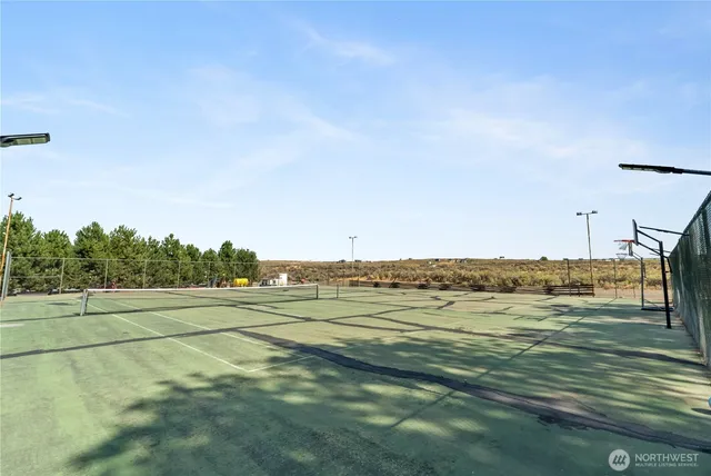 a kitchen with stainless steel appliances a sink stove and refrigerator