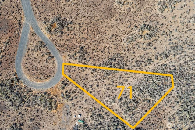 a view of a street with an ocean view