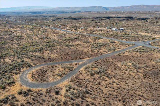 an aerial view of a house with outdoor space