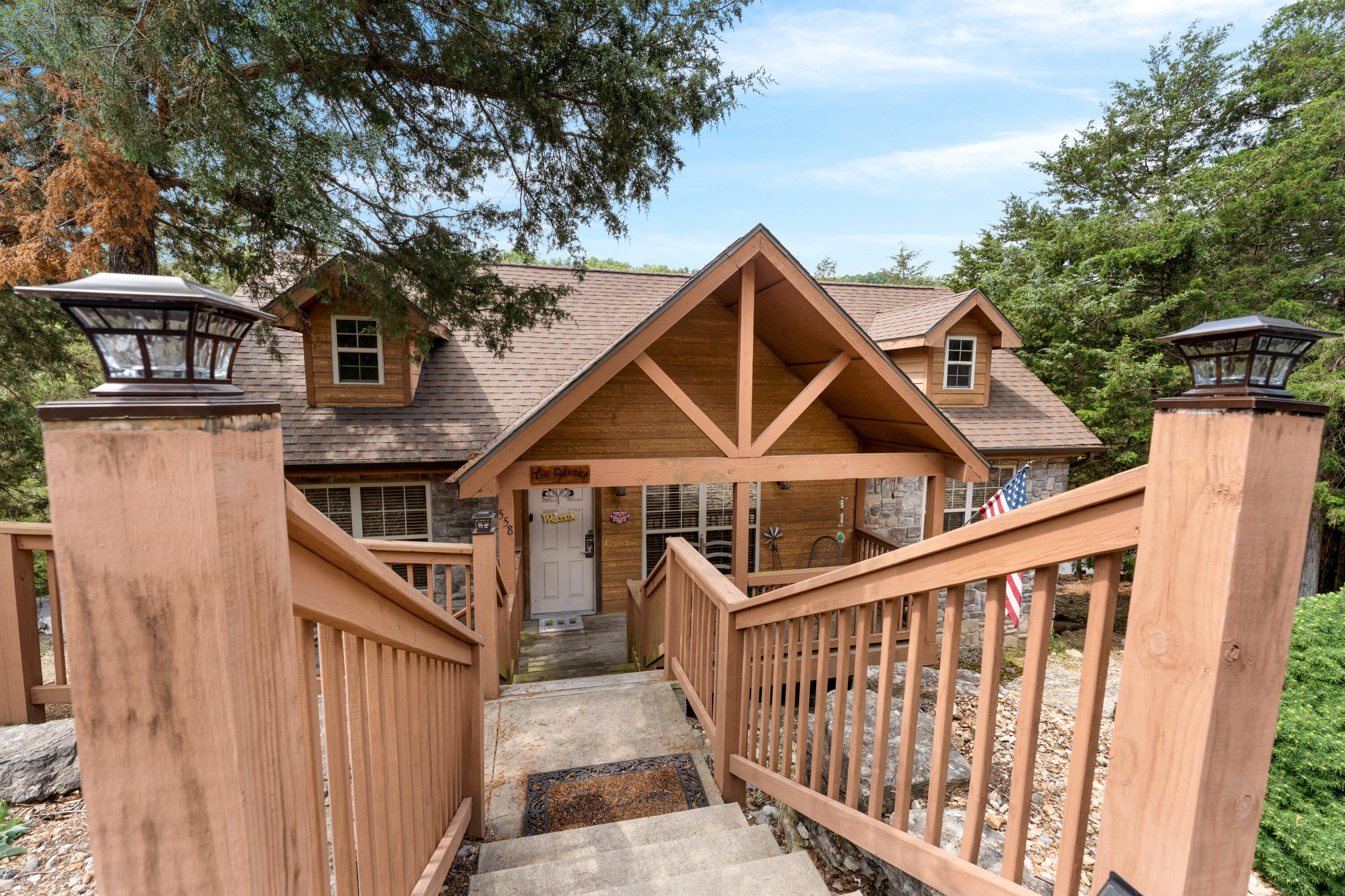 558 Baldknobber Drive, Unit 49 Reeds Spring, MO 65737 - Photo 2 of 40 Front of lodge 4
