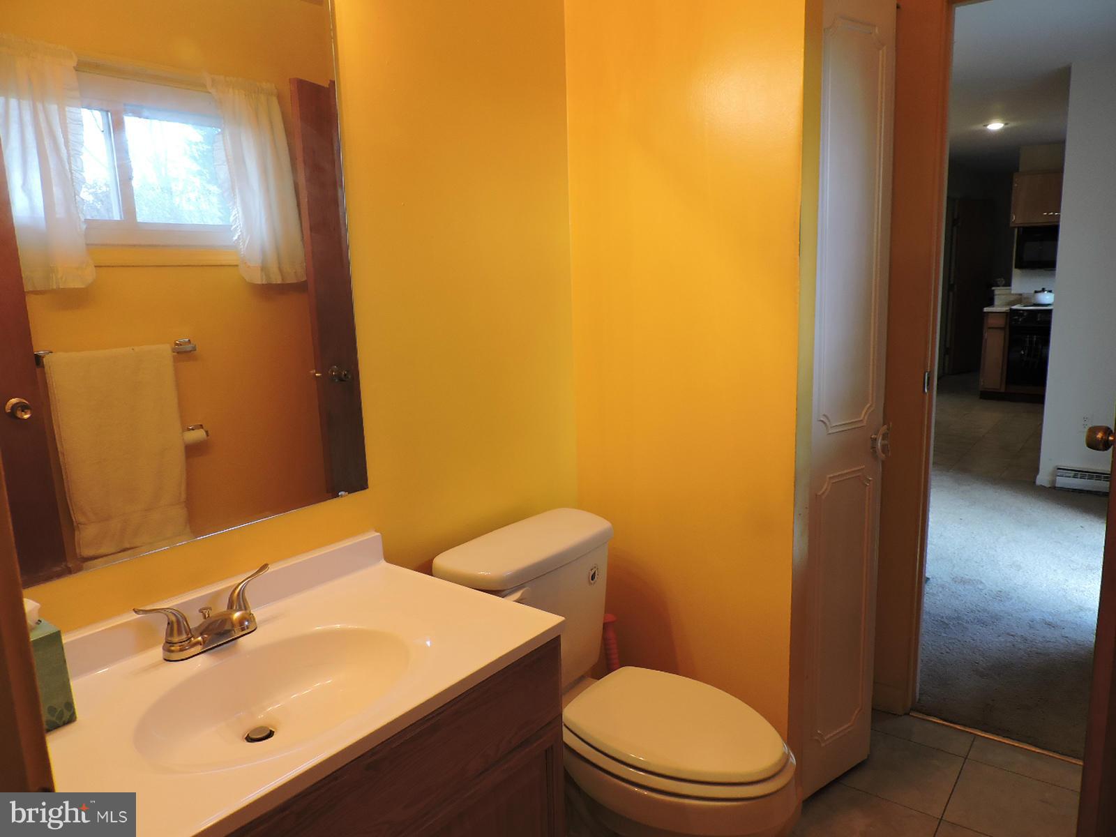 606 Poplar Road Sterling, VA 20164 - Photo 14 of 24 Half Bath with Dual Entry