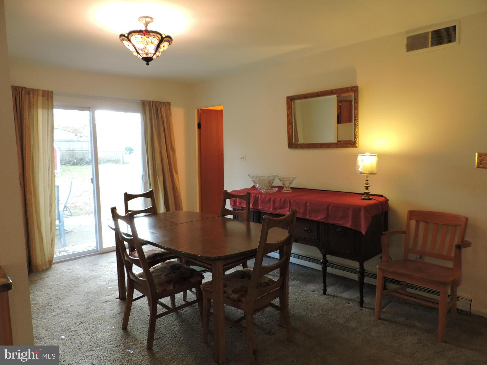 606 Poplar Road Sterling, VA 20164 - Photo 5 of 24 Dining Room with Tiffany-style Chandelier