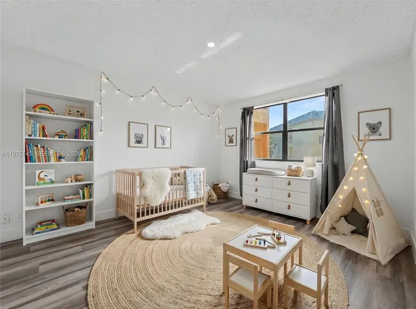 a bathroom with a sink a toilet and bathtub