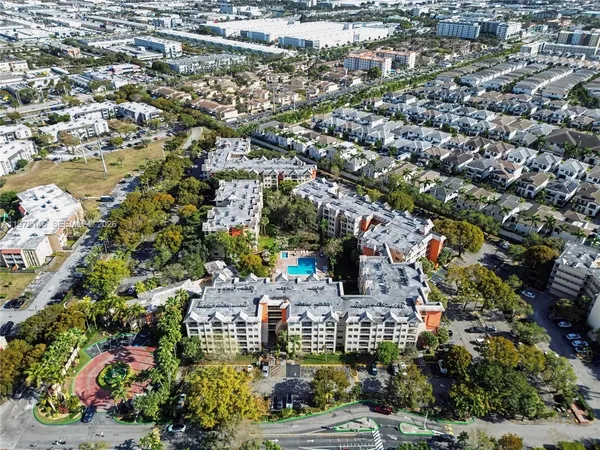 an aerial view of a house with a garden