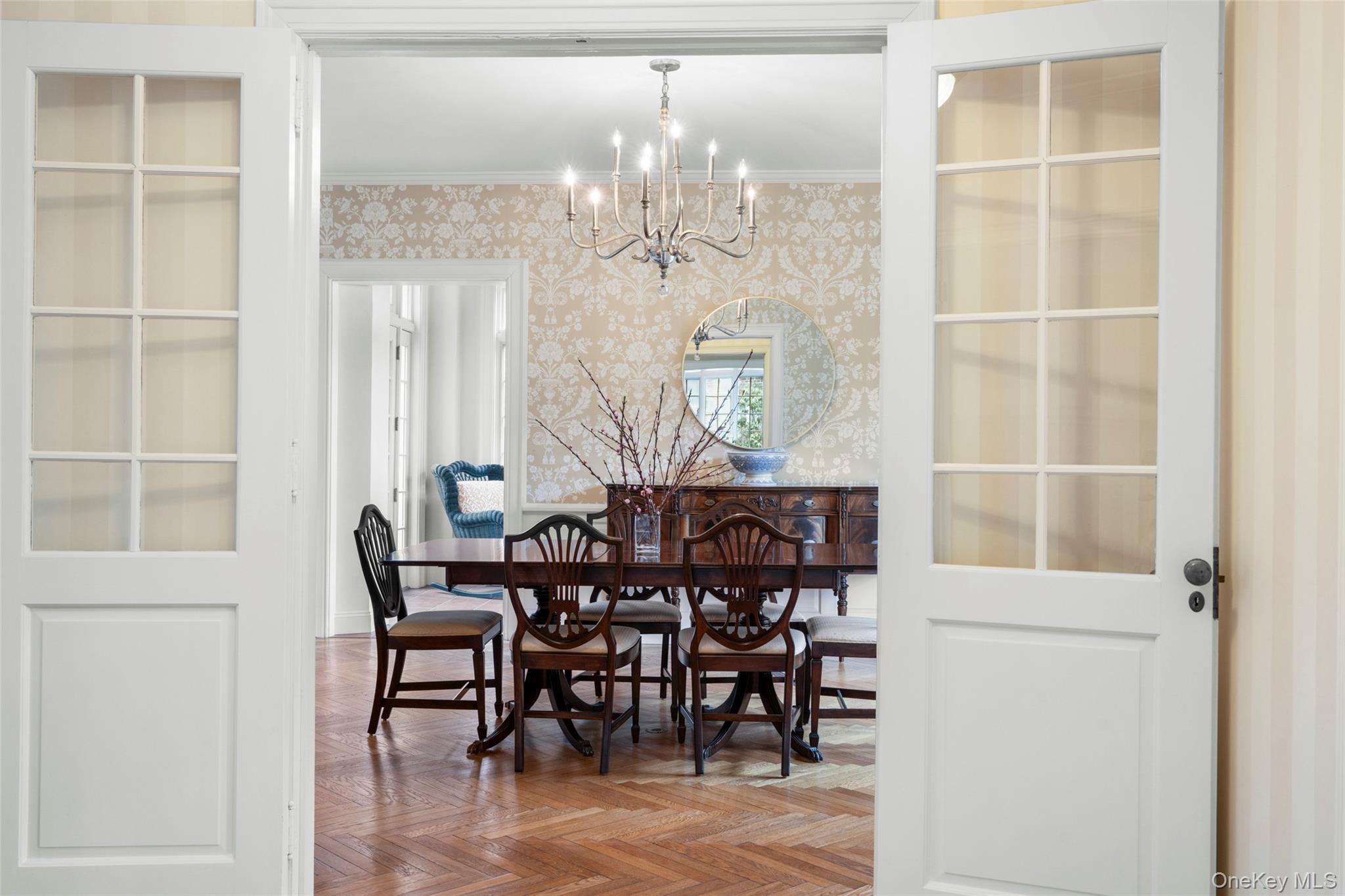 80 Forest Avenue New Rochelle, NY 10804 - Photo 11 of 48 a view of a dining room with furniture and chandelier