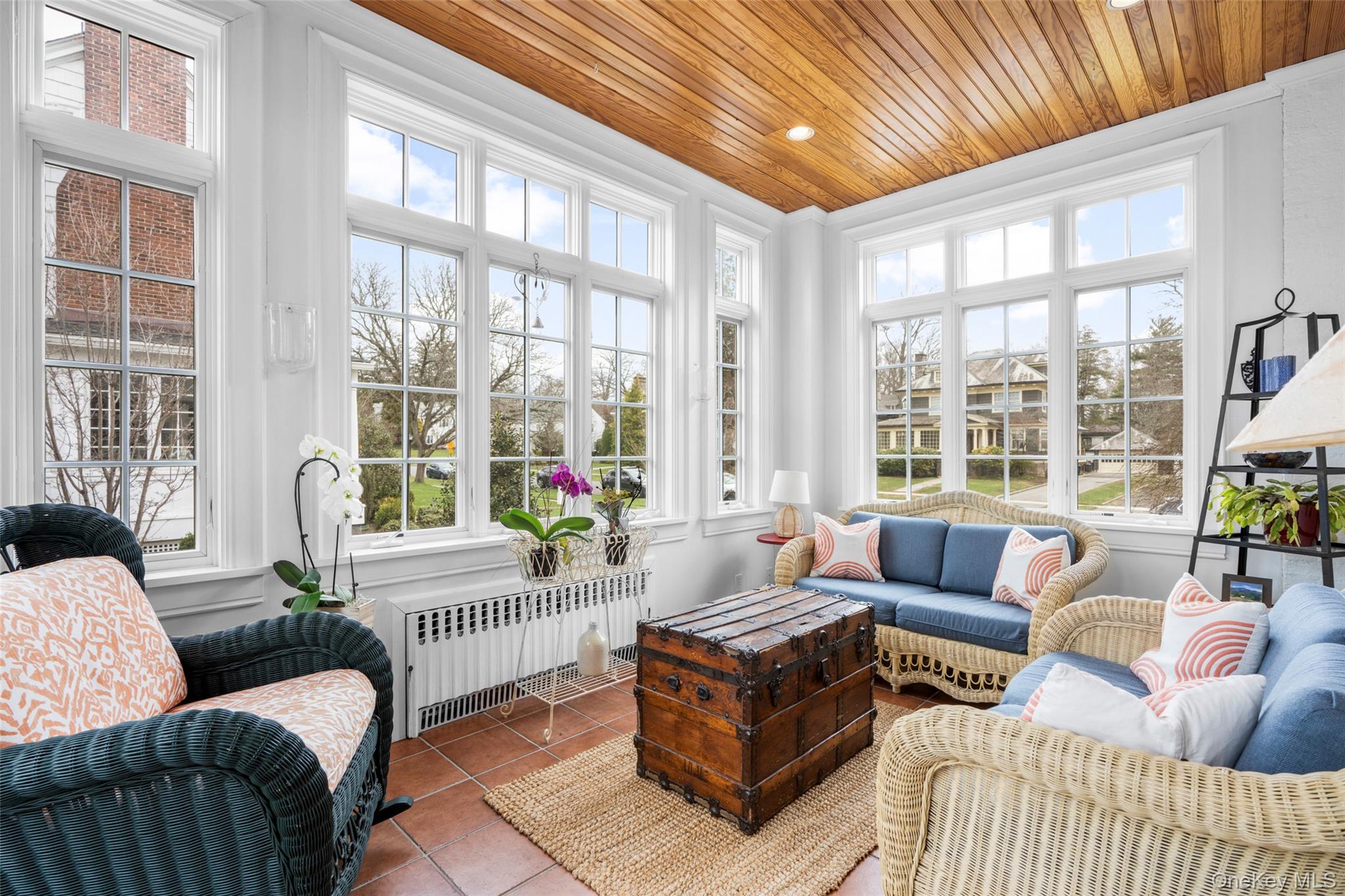 80 Forest Avenue New Rochelle, NY 10804 - Photo 13 of 48 a living room with furniture and a large window