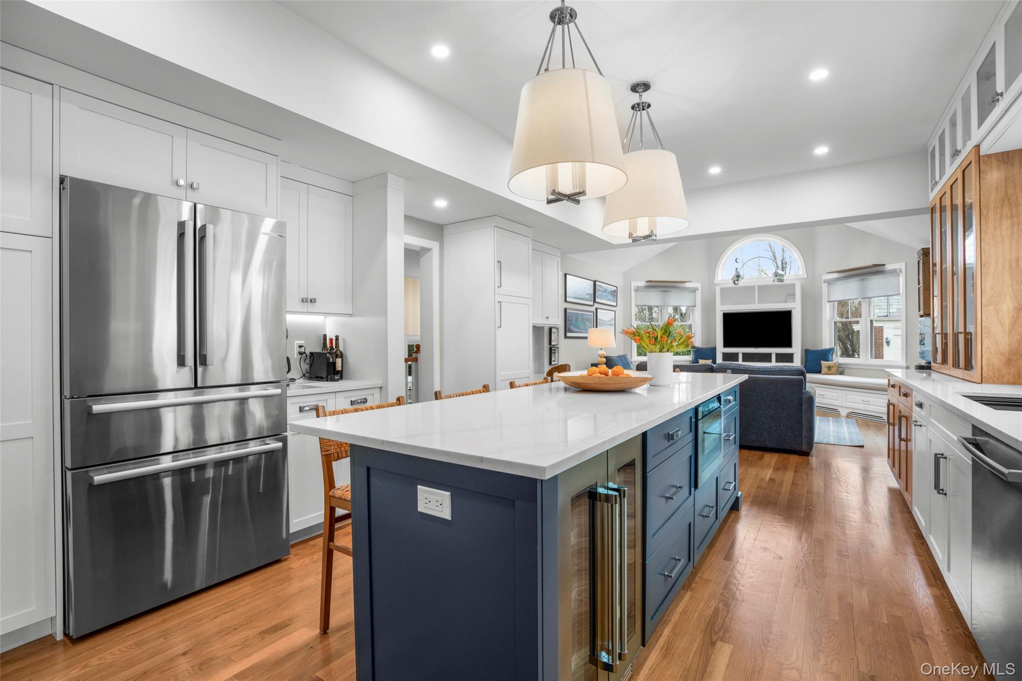 80 Forest Avenue New Rochelle, NY 10804 - Photo 17 of 48 a kitchen with kitchen island granite countertop a center island a sink stainless steel appliances and cabinets