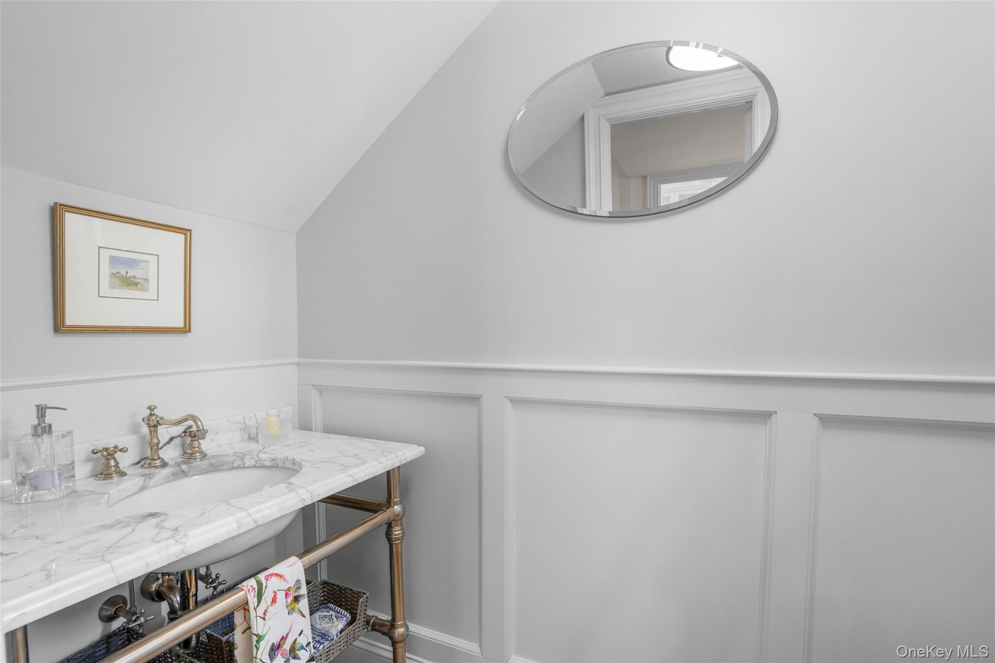 80 Forest Avenue New Rochelle, NY 10804 - Photo 21 of 48 a bathroom with a sink and a mirror