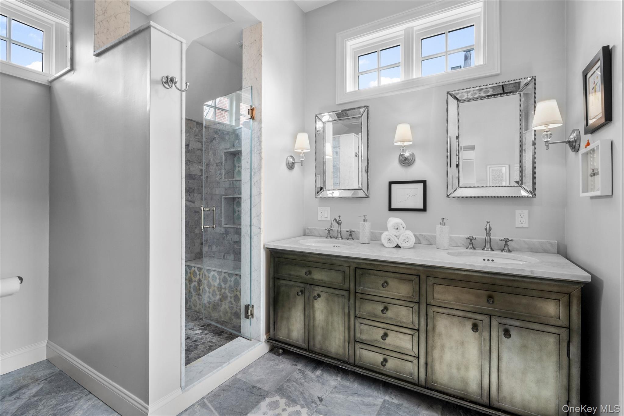 80 Forest Avenue New Rochelle, NY 10804 - Photo 25 of 48 a bathroom with a double vanity sink mirror and double