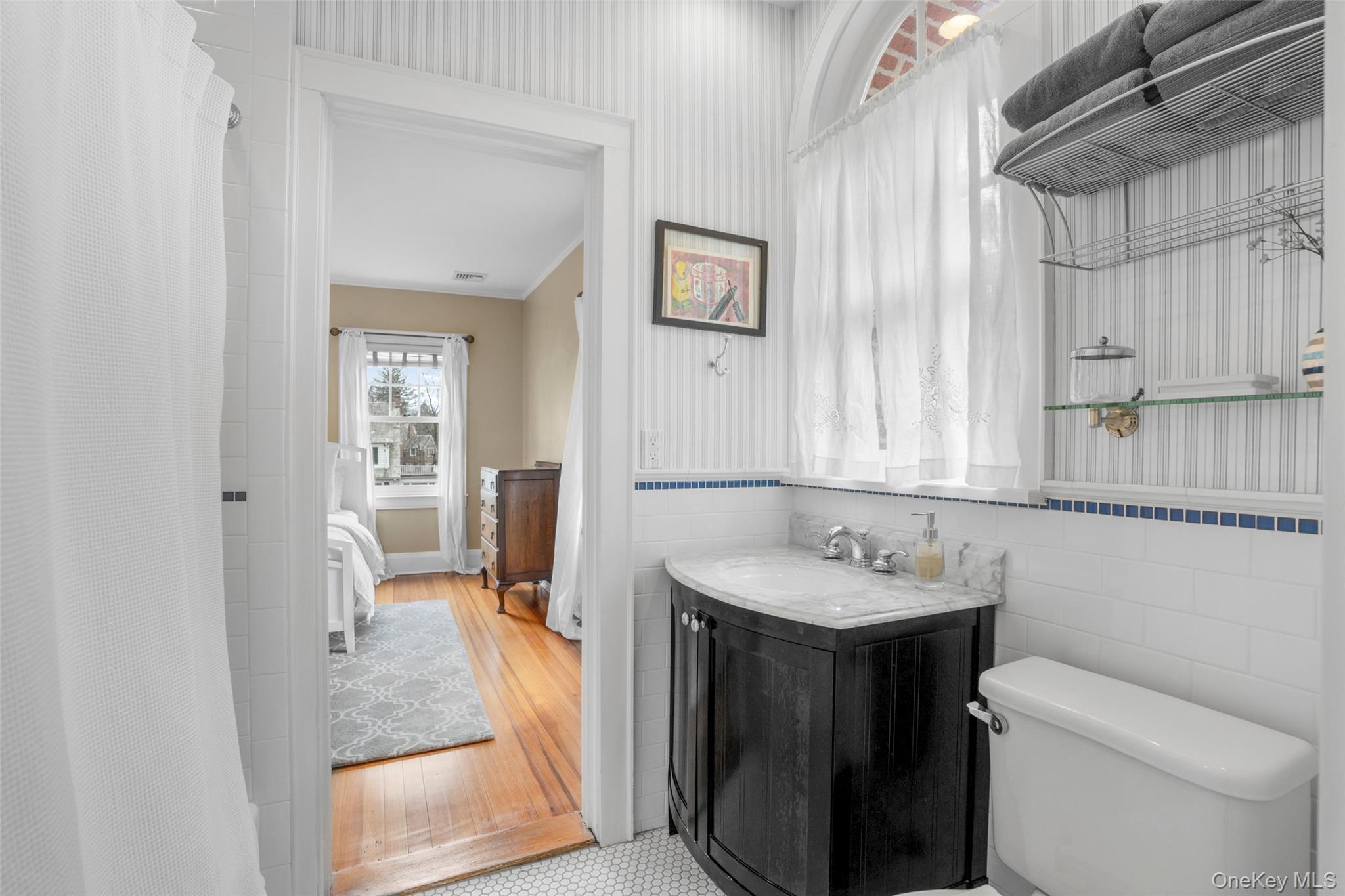 80 Forest Avenue New Rochelle, NY 10804 - Photo 28 of 48 a bathroom with a sink toilet and shower