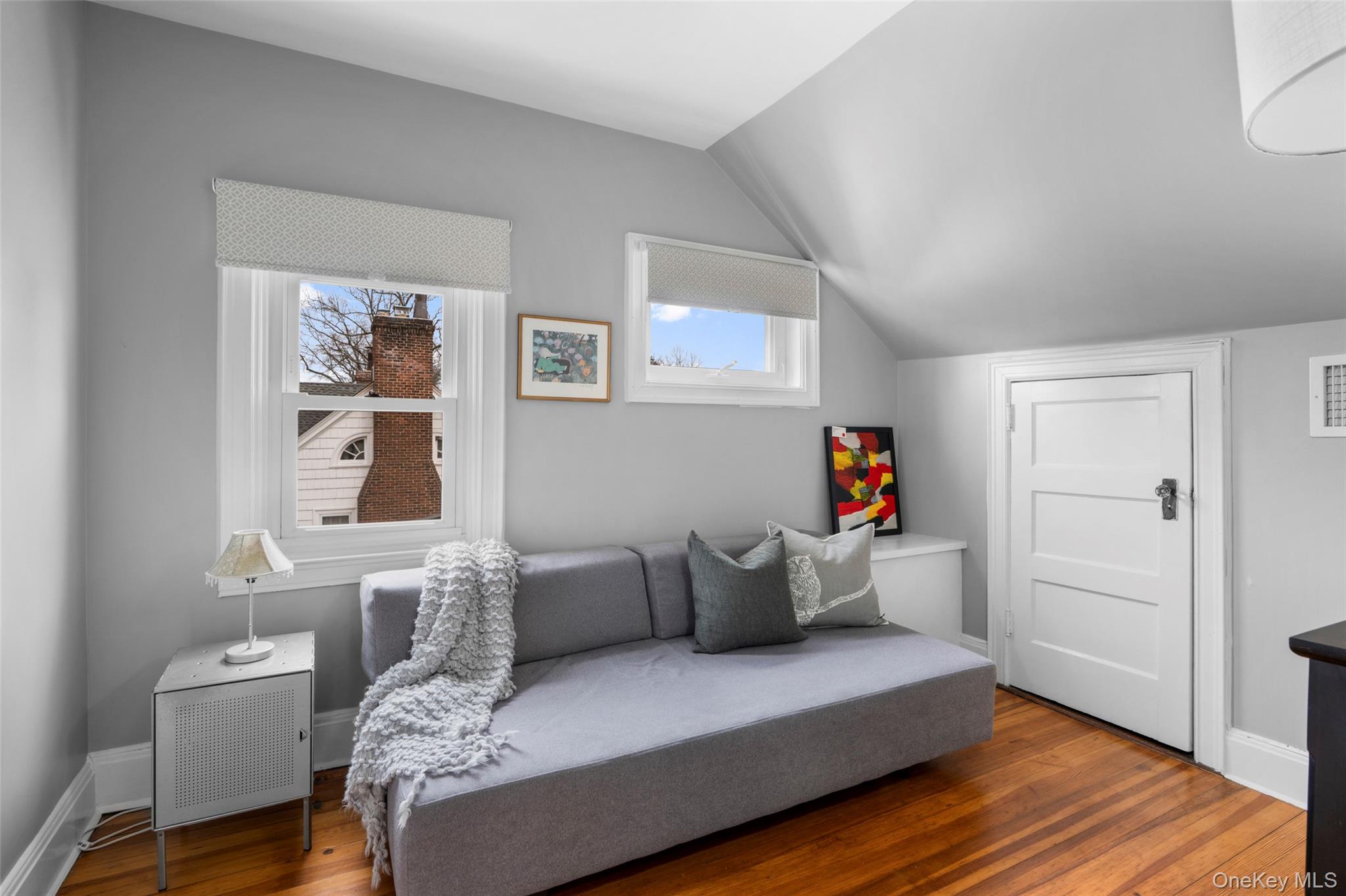 80 Forest Avenue New Rochelle, NY 10804 - Photo 32 of 48 a living room with furniture and wooden floor
