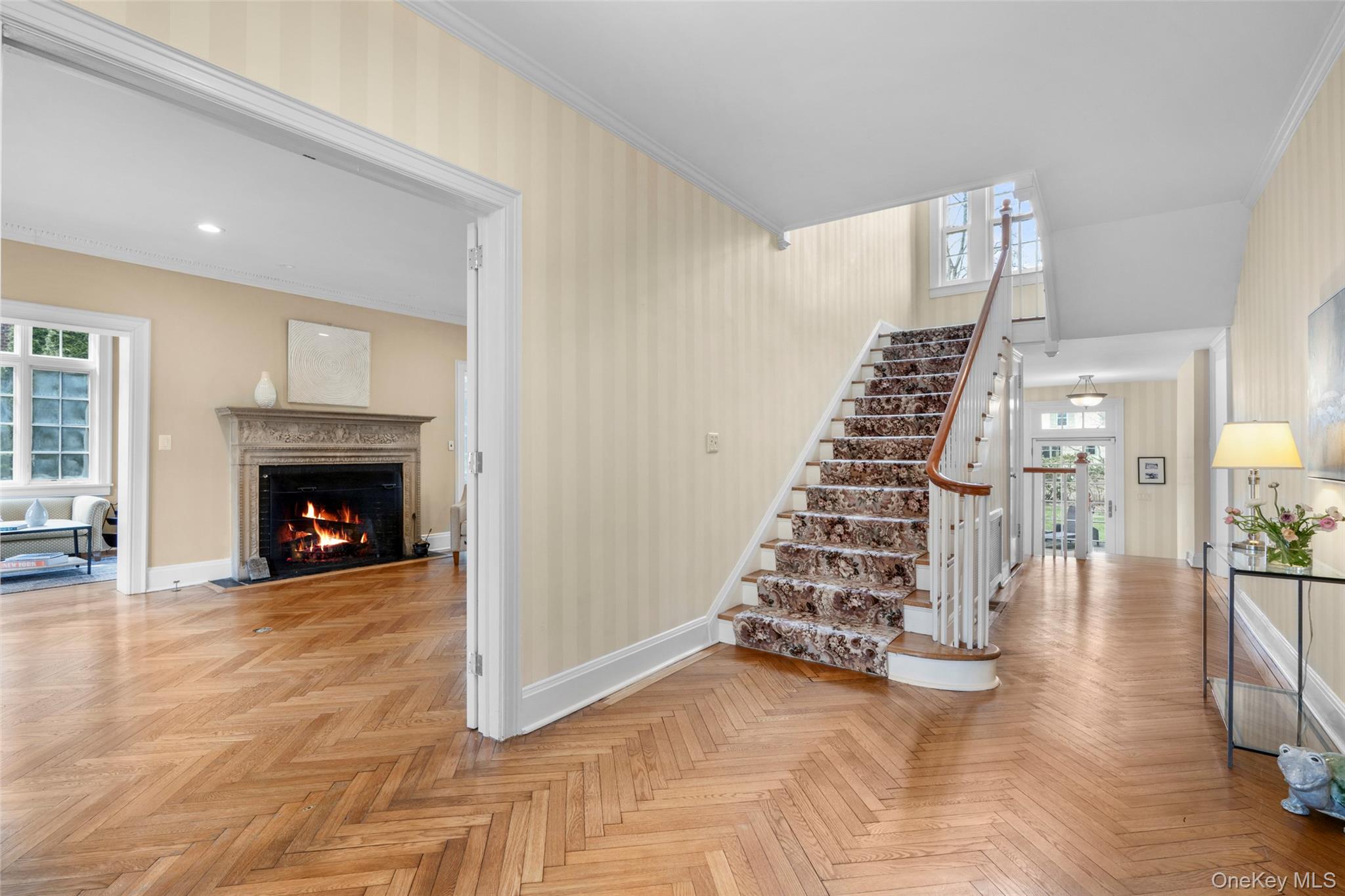 80 Forest Avenue New Rochelle, NY 10804 - Photo 5 of 48 a view of an empty room with stairs and fire place