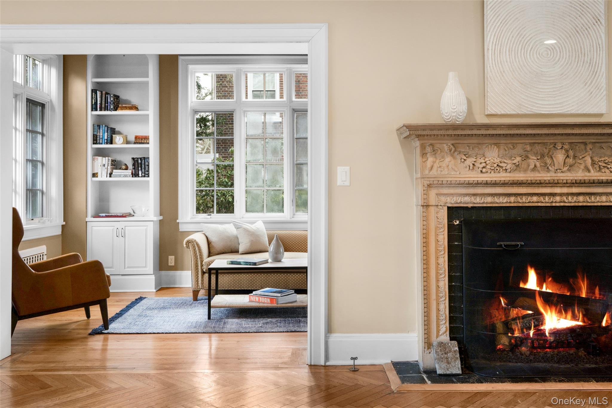 80 Forest Avenue New Rochelle, NY 10804 - Photo 9 of 48 a living room with furniture and a fireplace