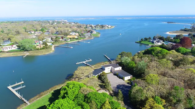 an aerial view of a houses with an outdoor space