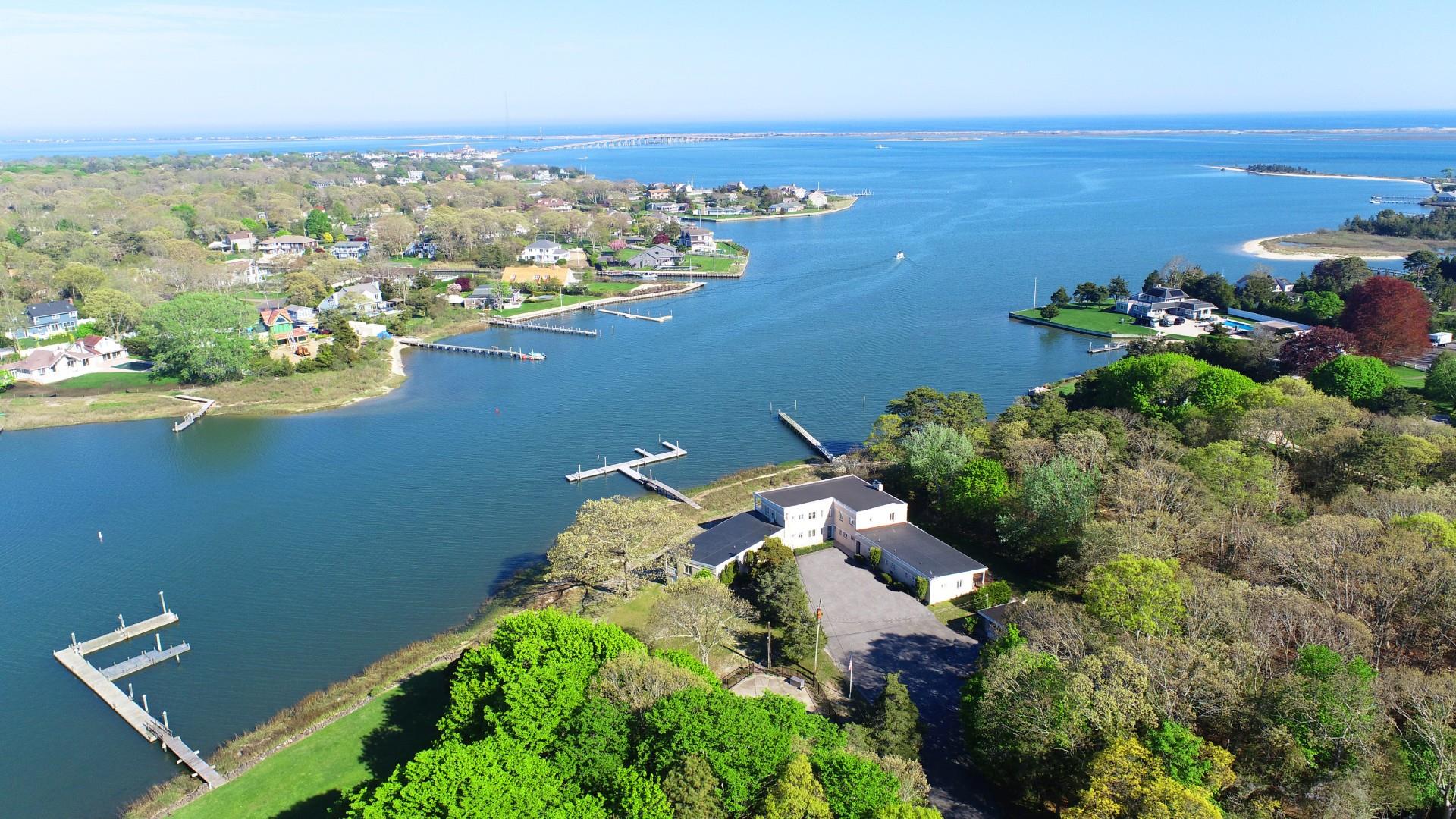 47 Rampasture Road, Unit M Hampton Bays, NY 11946 - Photo 4 of 17 an aerial view of a houses with an outdoor space