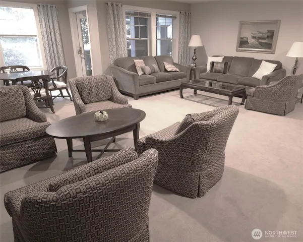 a living room with furniture and a couch