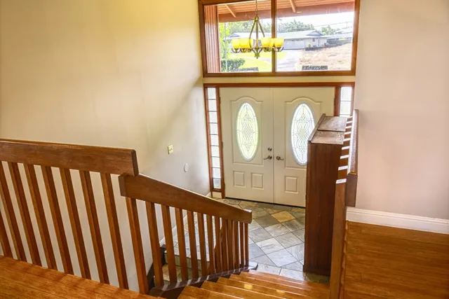 a view of a porch with wooden floor