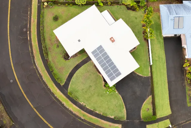 a view of a swimming pool with a balcony