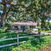 a view of a garden with an outdoor space