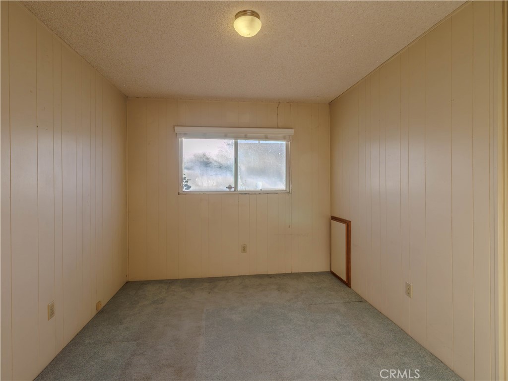 8815 San Vicente Avenue Riverside, CA 92503 - Photo 14 of 27 an empty room with a window