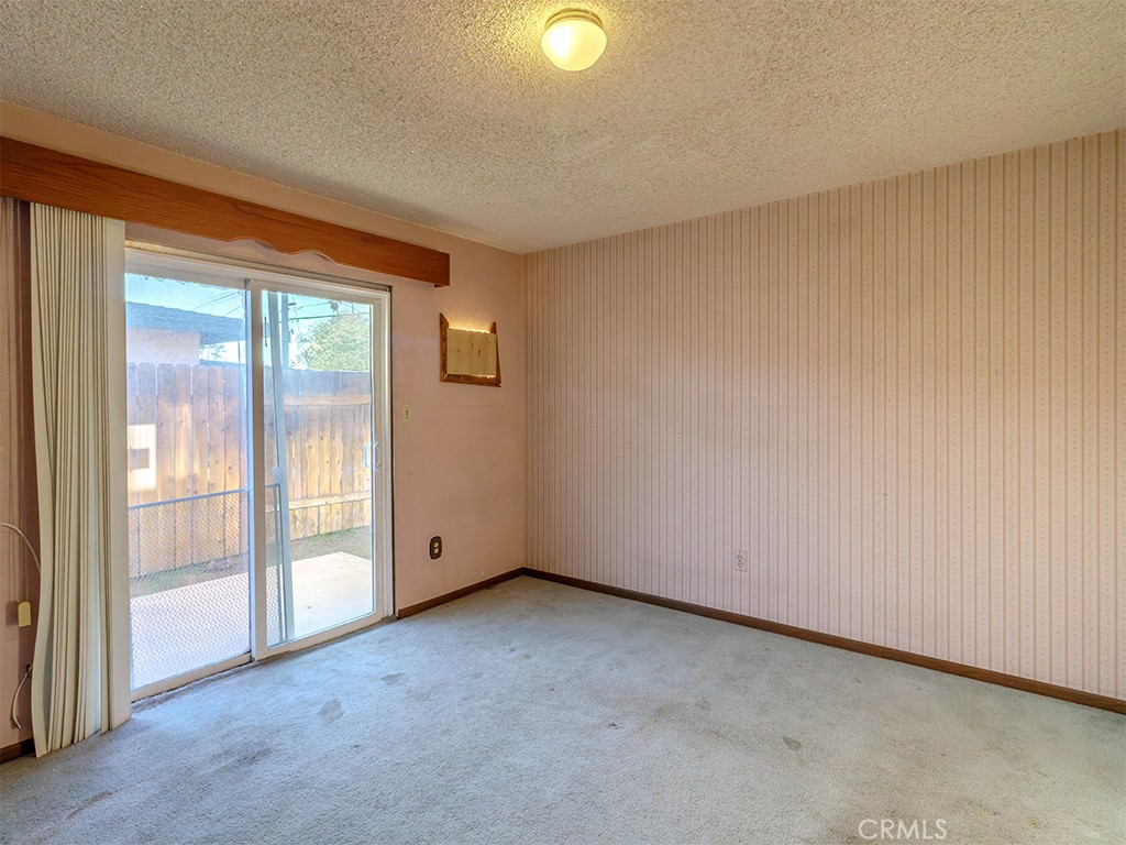8815 San Vicente Avenue Riverside, CA 92503 - Photo 15 of 27 a view of an empty room with a window