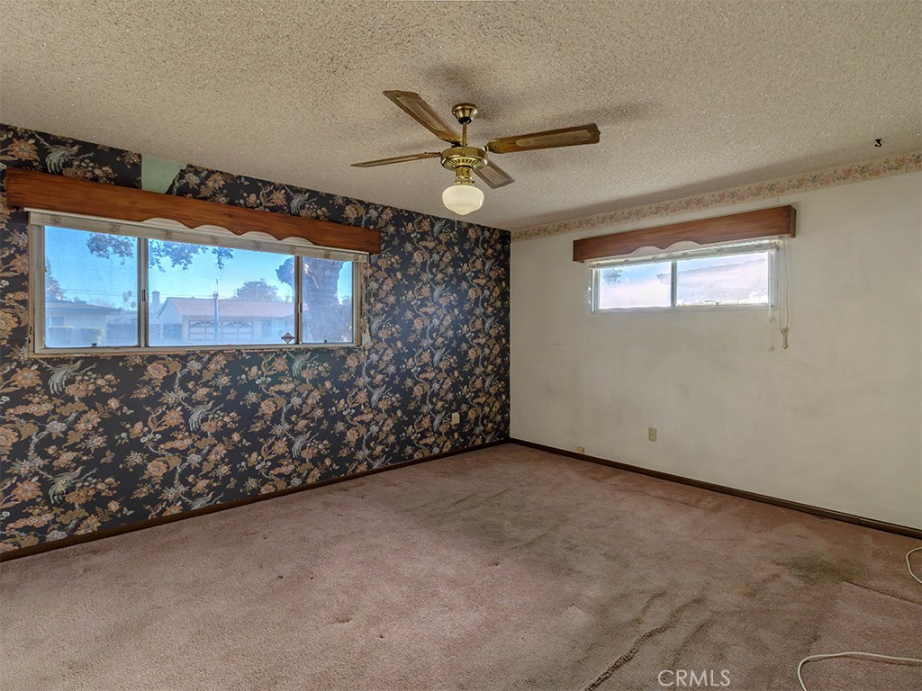 8815 San Vicente Avenue Riverside, CA 92503 - Photo 7 of 27 a view of an empty room with a window
