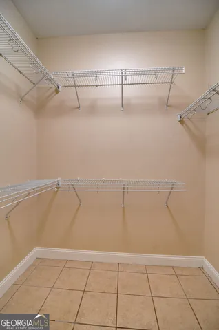 a view of an empty walk in closet