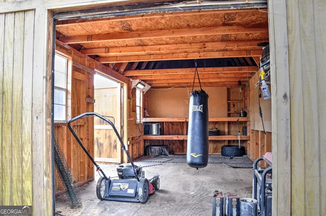 a room with lots of furniture and a window