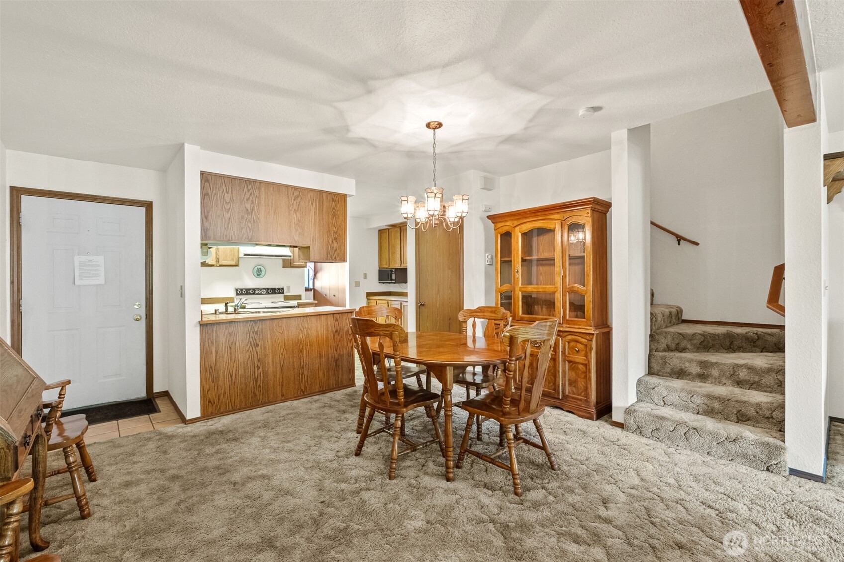 110 Icicle Road, Unit K Leavenworth, WA 98826 - Photo 13 of 26 a view of a dining room with furniture and chandelier
