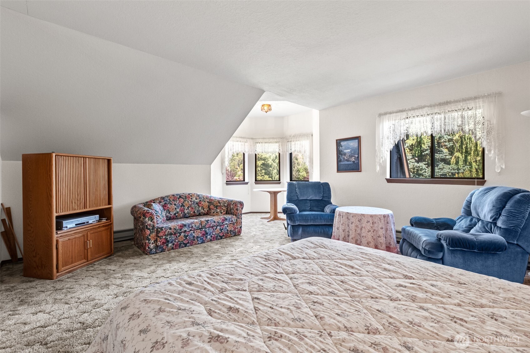 110 Icicle Road, Unit K Leavenworth, WA 98826 - Photo 15 of 26 a bedroom with furniture and a window