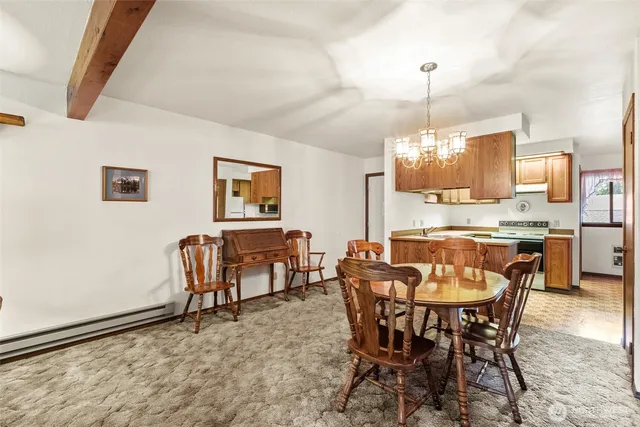 a view of a dining room with furniture