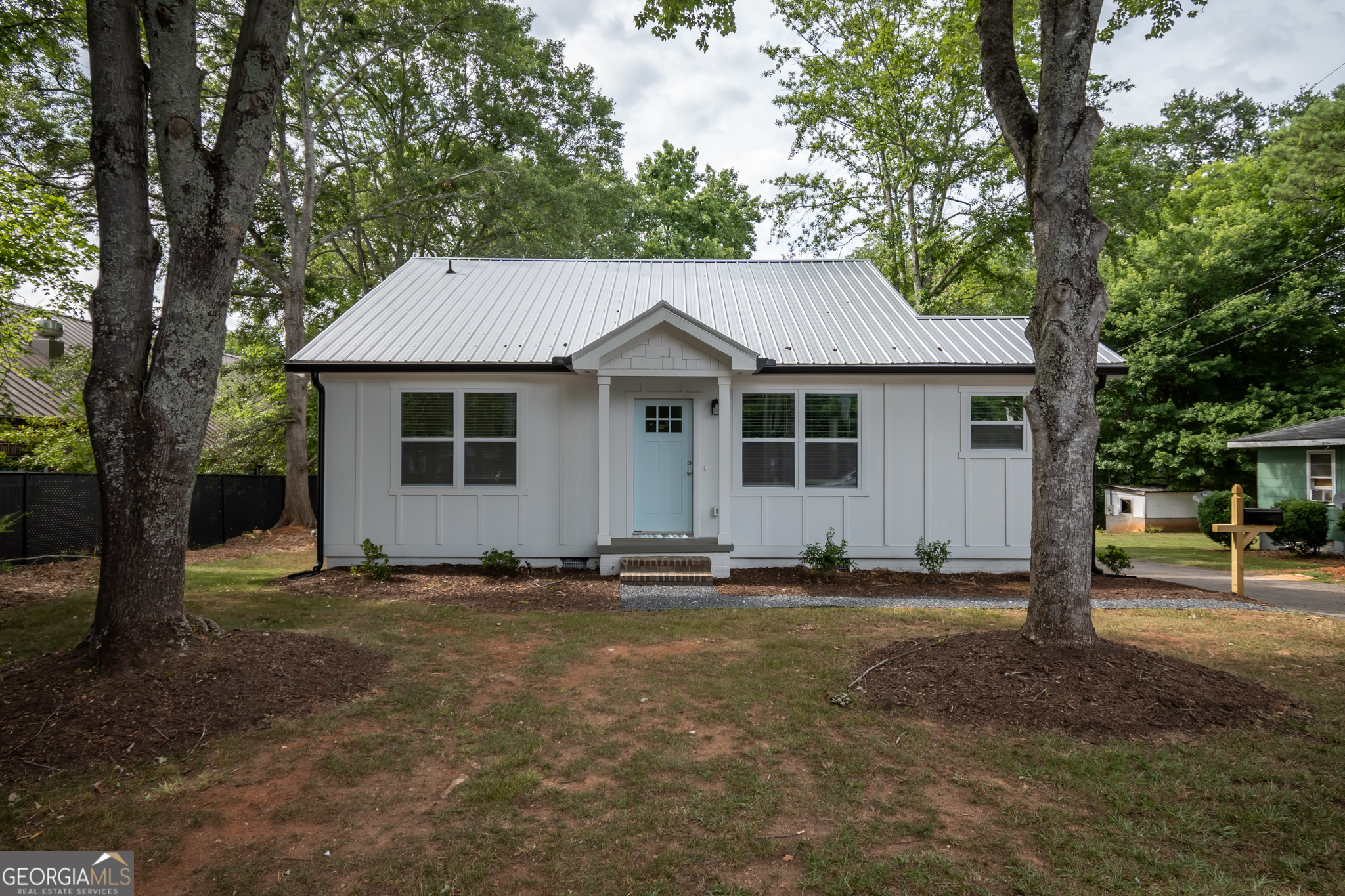 888 Oglethorpe Avenue Athens, GA 30606 - Photo 1 of 1 a front view of a house with a yard