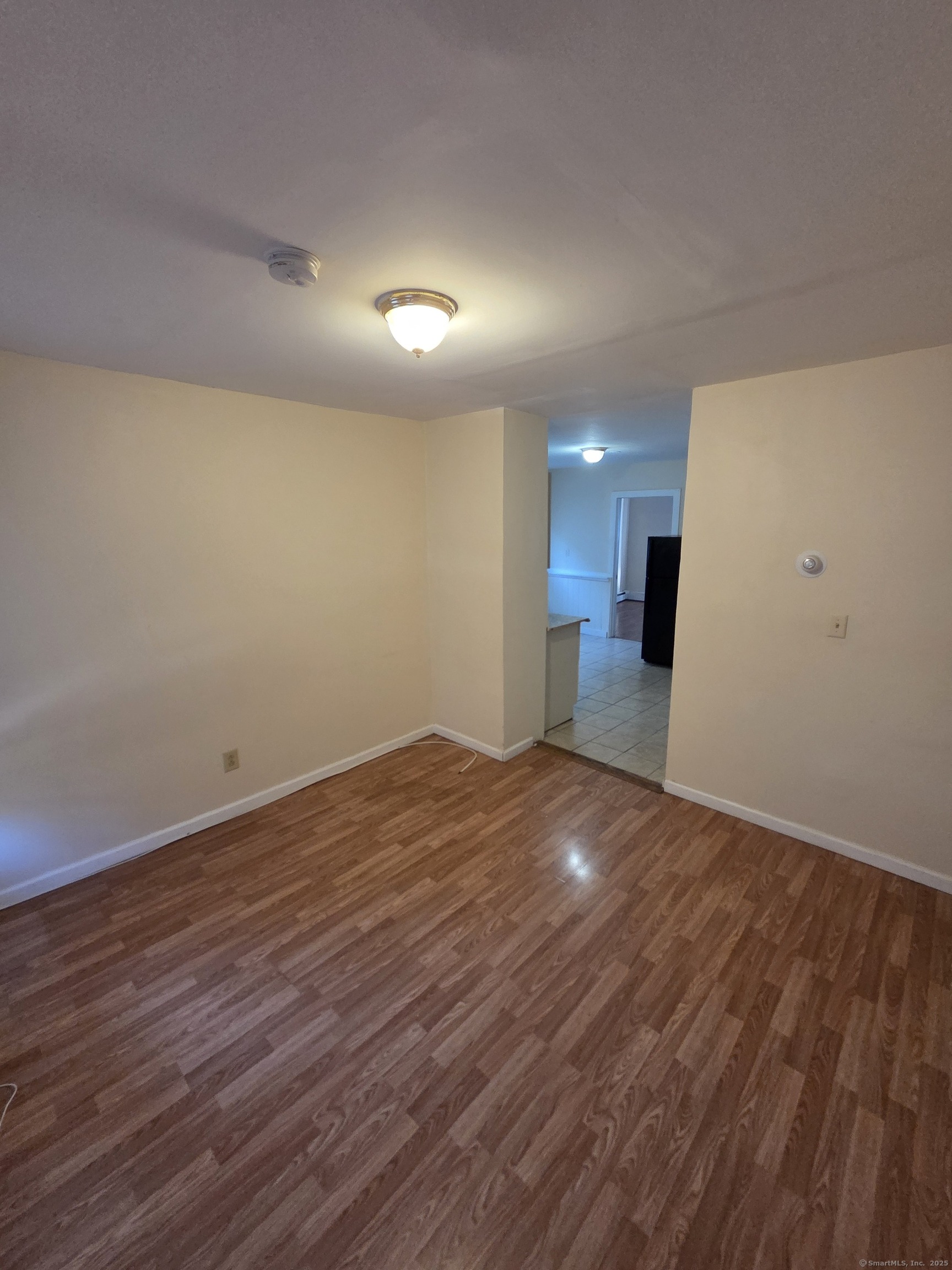38 Walnut Street New Haven, CT 06511 - Photo 6 of 8 a view of empty room with wooden floor