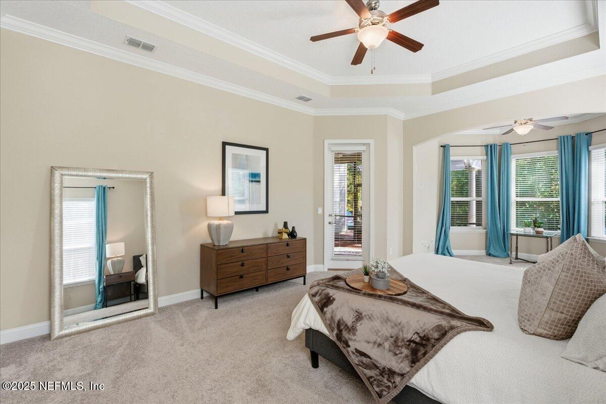 483 St Kitts Loop St. Augustine, FL 32092 - Photo 24 of 52 a bedroom with bed and window