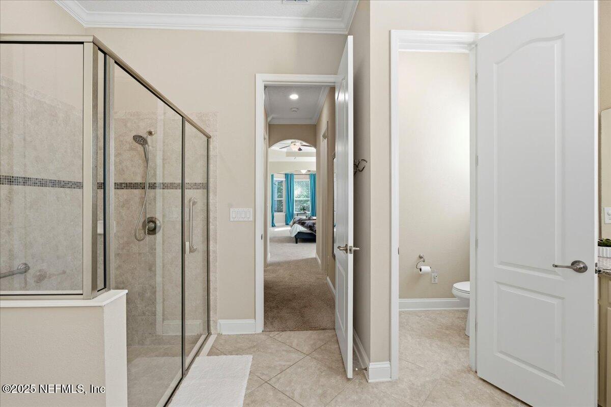 483 St Kitts Loop St. Augustine, FL 32092 - Photo 26 of 52 a view of a hallway with closet and bathroom