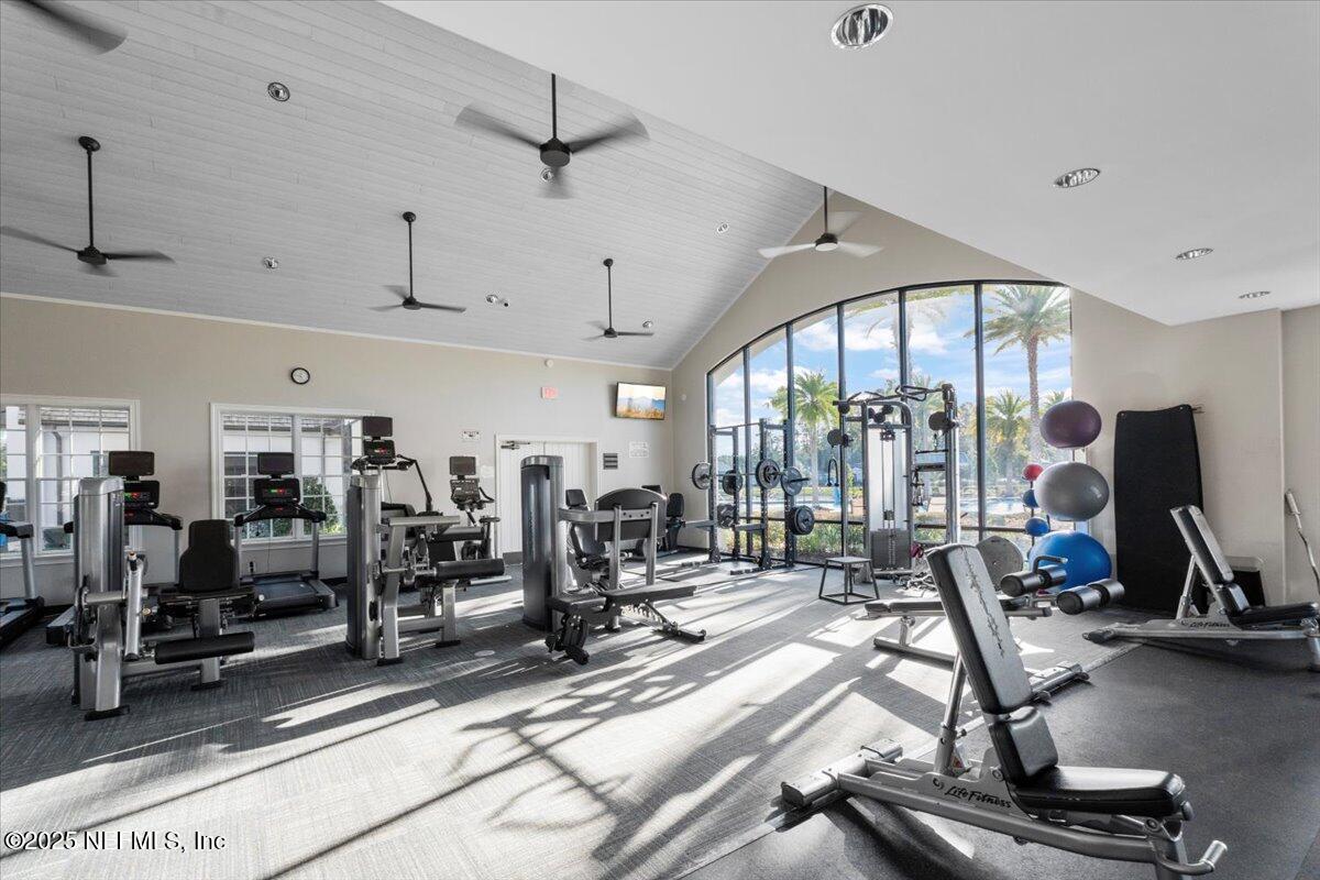 483 St Kitts Loop St. Augustine, FL 32092 - Photo 47 of 52 a view of a room with gym equipment
